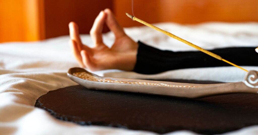 meditation with incense sticks